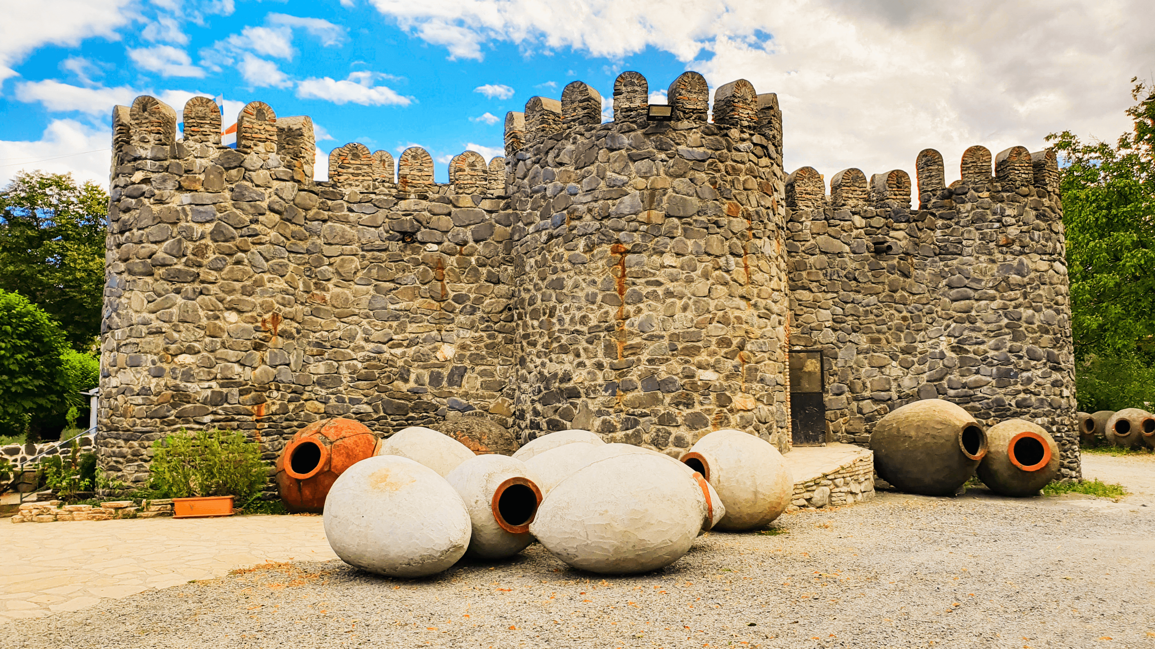 Georgian winery fortress and qvevri vessels
